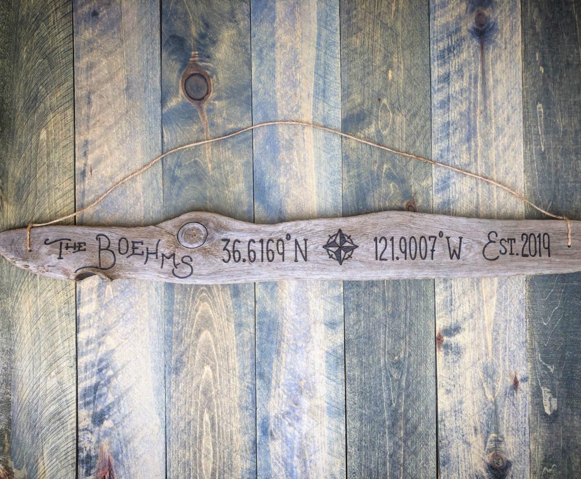 Driftwood Sign with family established date and coordinates