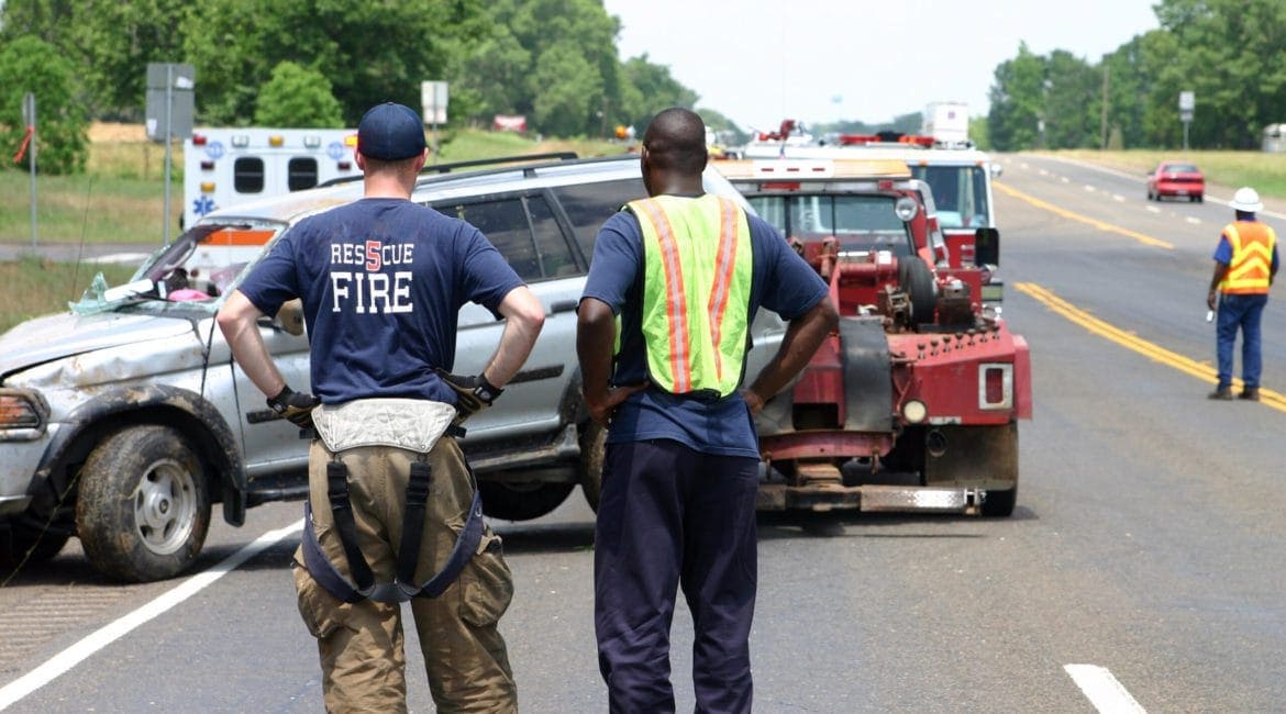 Houston lawyer reviewing car accident evidence with client