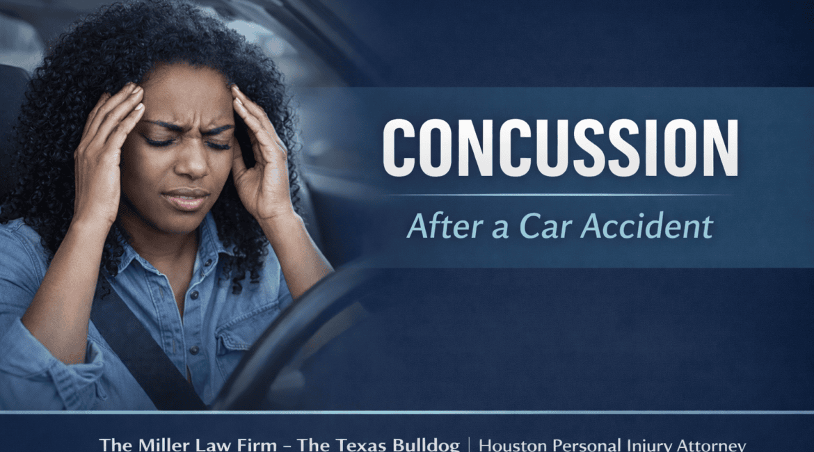 Woman experiencing concussion symptoms after a car accident while holding her head in pain inside a vehicle