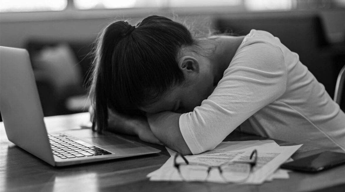 Frustrated personal injury client feeling ignored by an unresponsive lawyer