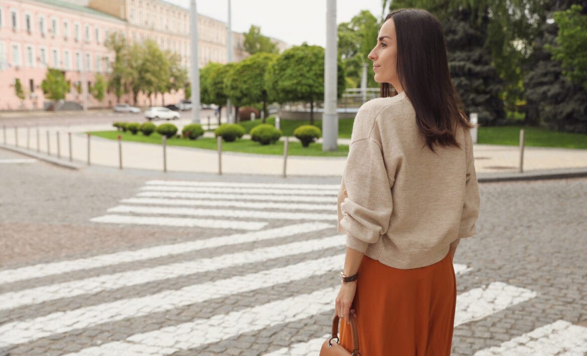 woman crossing street.
