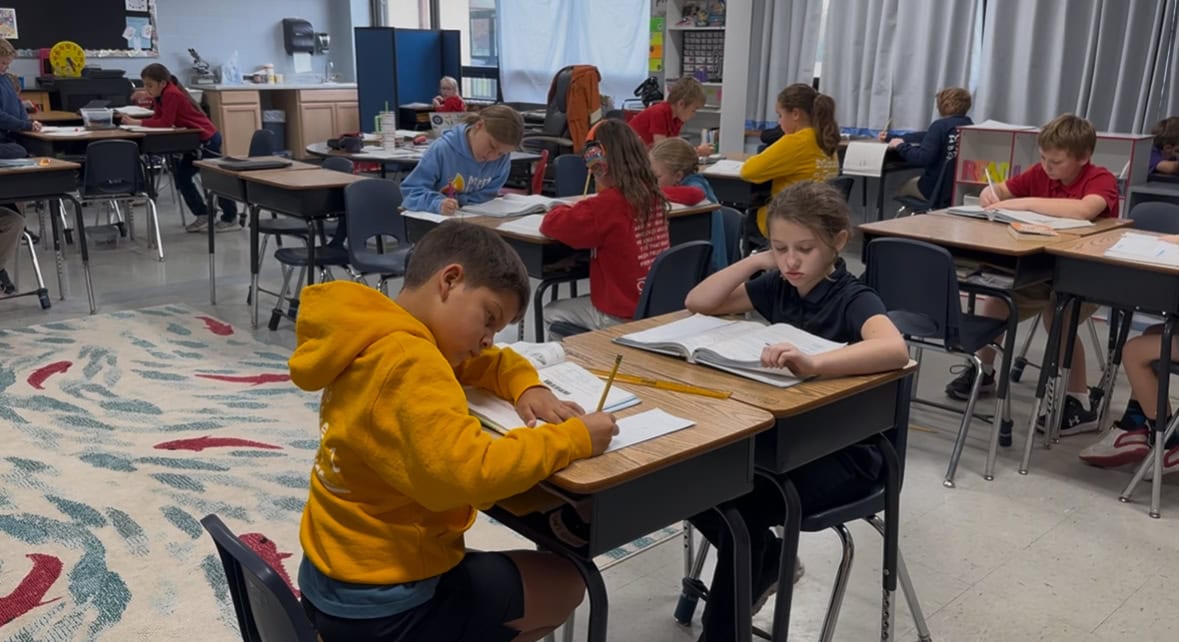 Third and fourth graders doing desk work at Martin Luther School, a Christian school in Joplin, MO