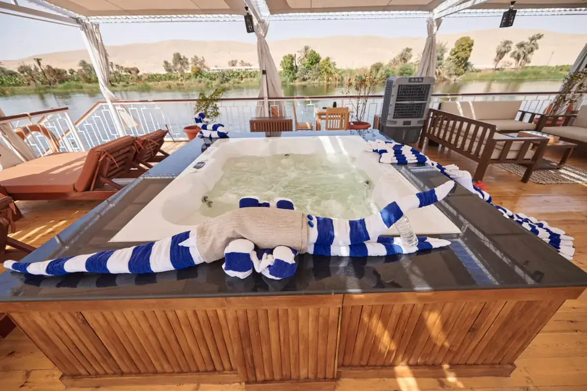 Outdoor jacuzzi and shaded deck area