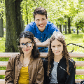 happy-students-posing-bench
