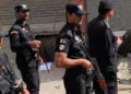 Four Customs officials, traffic police official