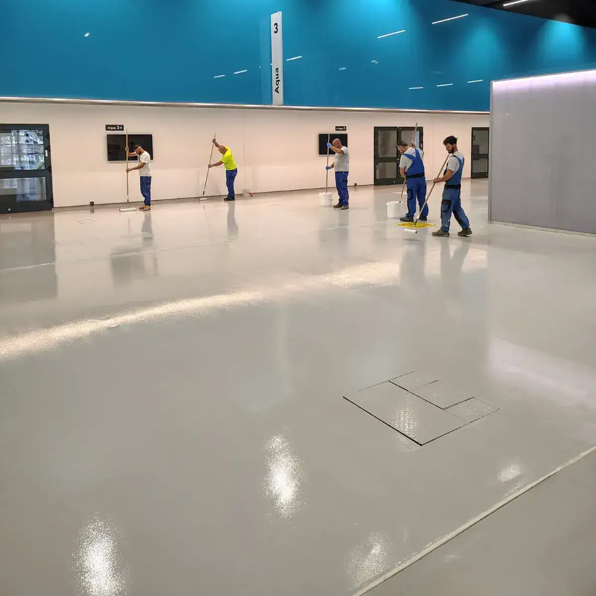 Mapefloor Finish 59 W+finitura trasprente: finitura poliuretanica alifatica bicomponente colorata per il ripristino delle superfici del Centro Congressi MiCo di Fiera Milano