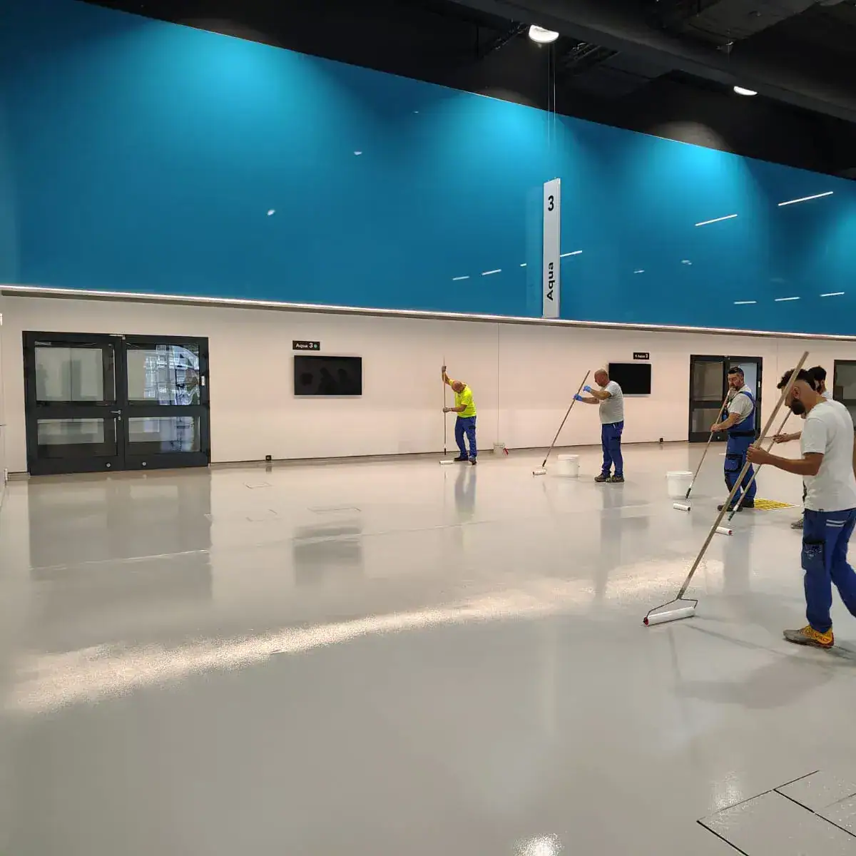 Mapefloor Finish 59 W+finitura trasparente: finitura poliuretanica alifatica bicomponente colorata per il ripristino delle superfici del Centro Congressi MiCo di Fiera Milano