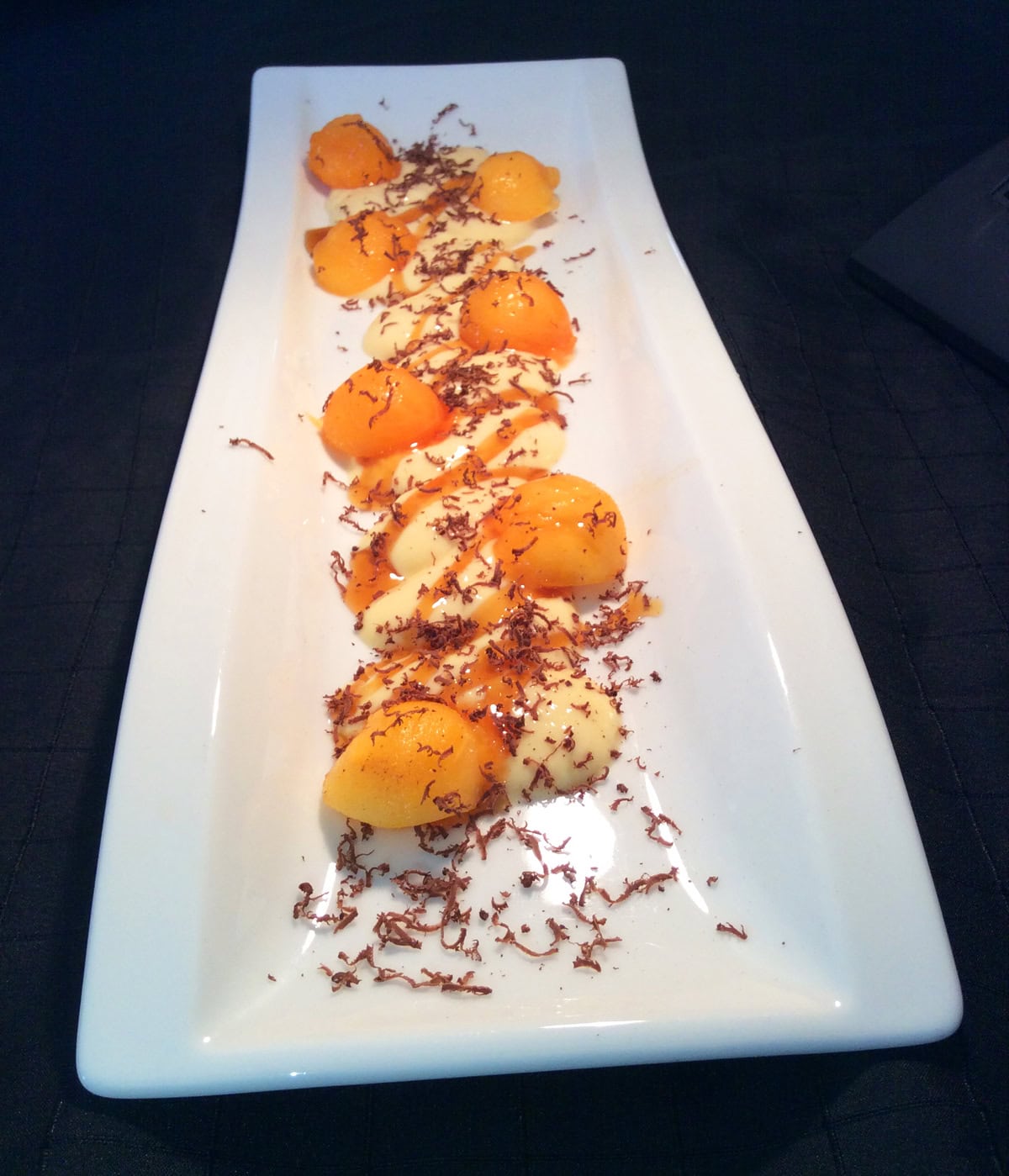 Recipe: Persimmon and vanilla pudding with shaved chocolate truffles