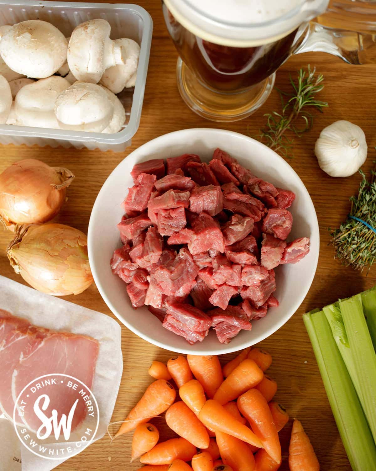 ingredients for easy steak and ale pie on a table