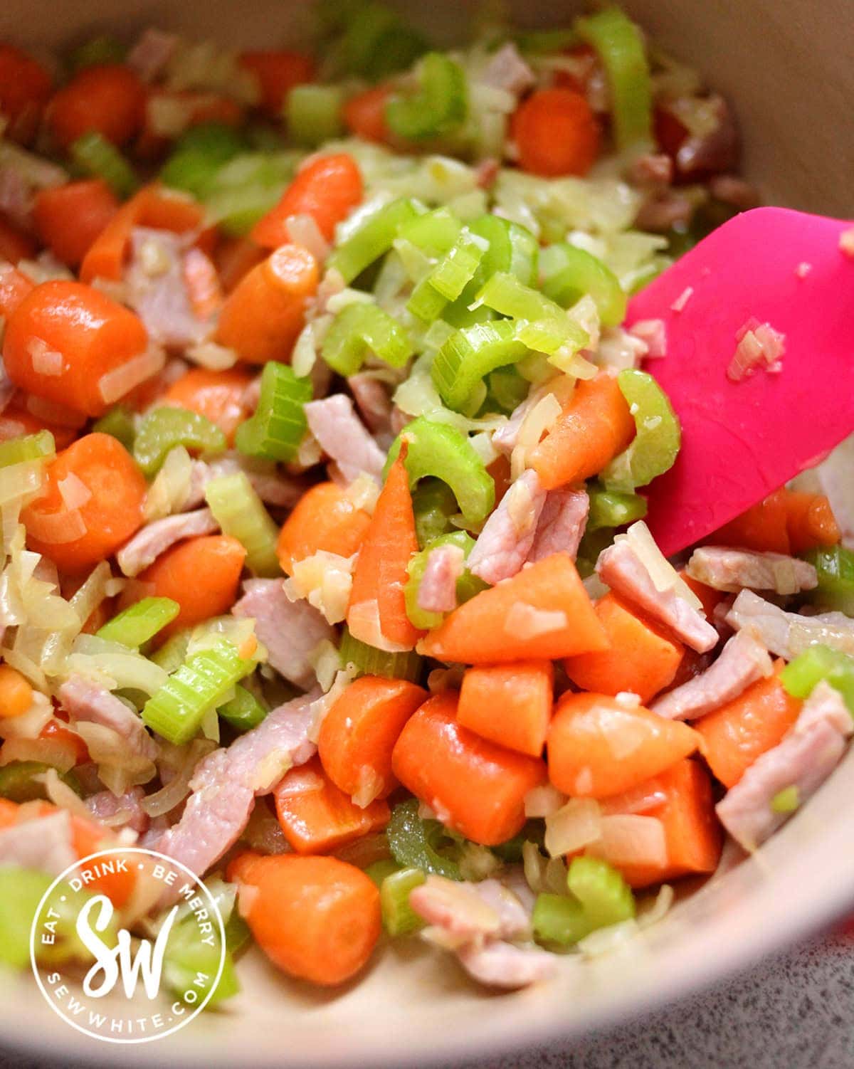 carrots, bacon, galric, onion and celery cooking