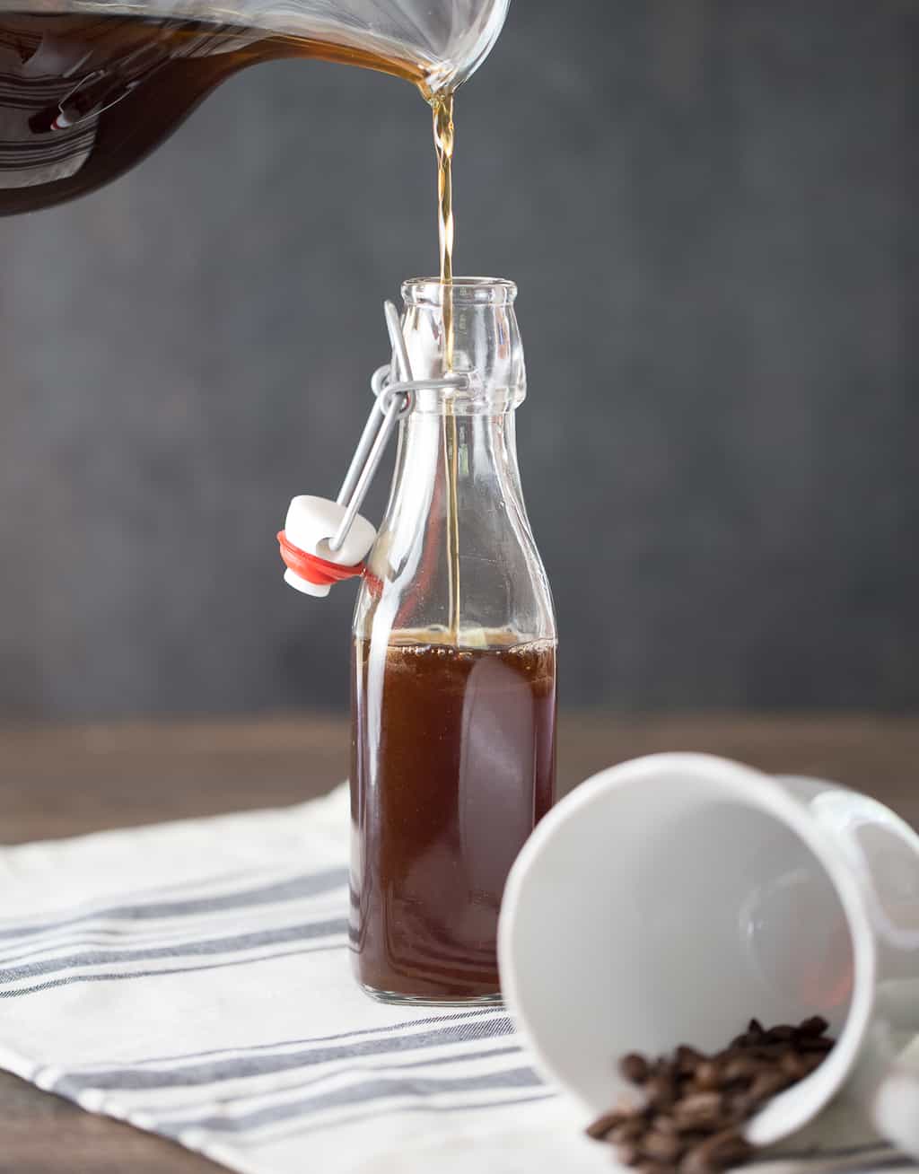 homemade kahlua going into jar