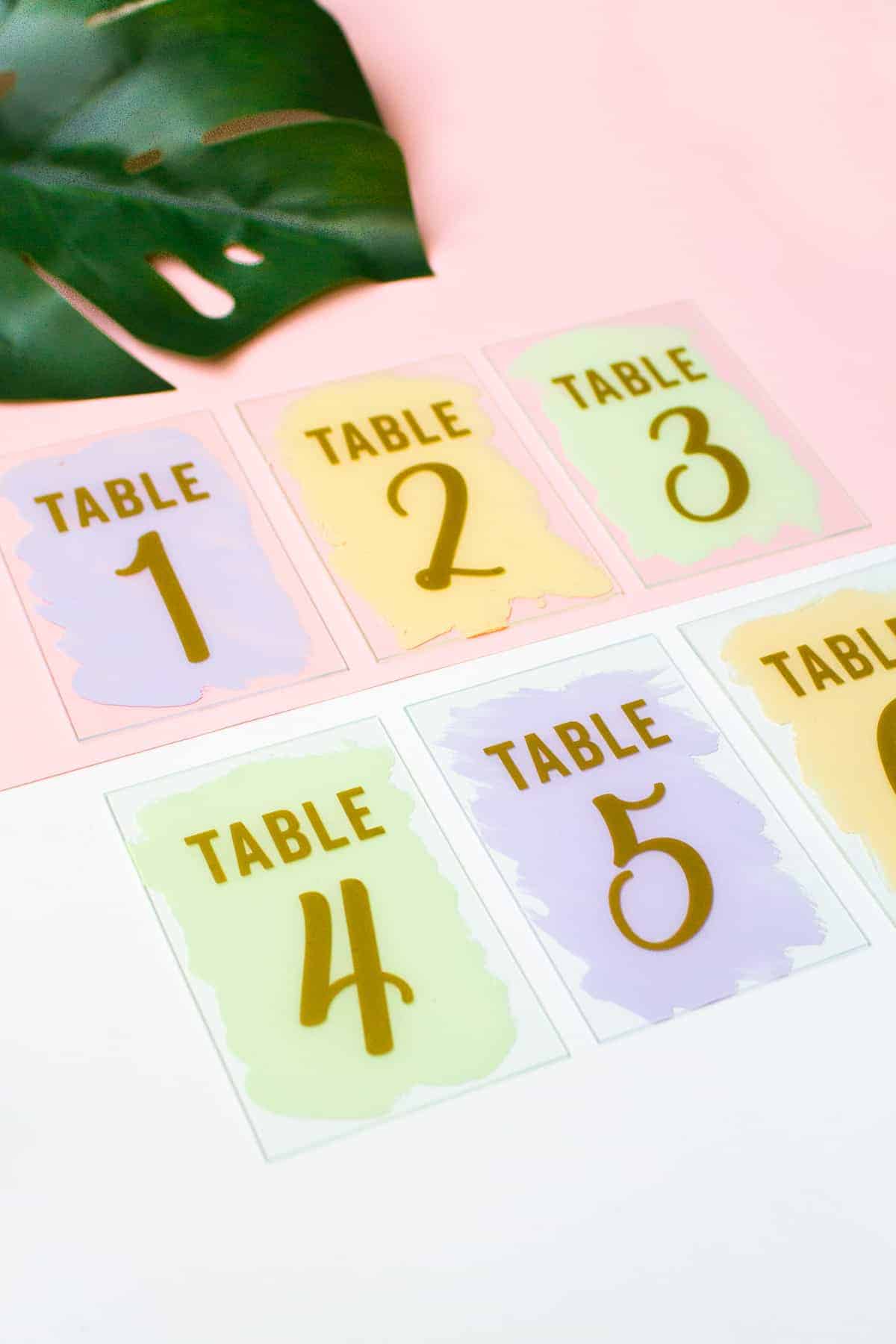 DIY THESE MODERN PASTEL PAINTED GLASS WEDDING TABLE NUMBERS - Diy Modern Painted Pastel Table Numbers Gold Vinyl Unique Handmade Easy Cheap