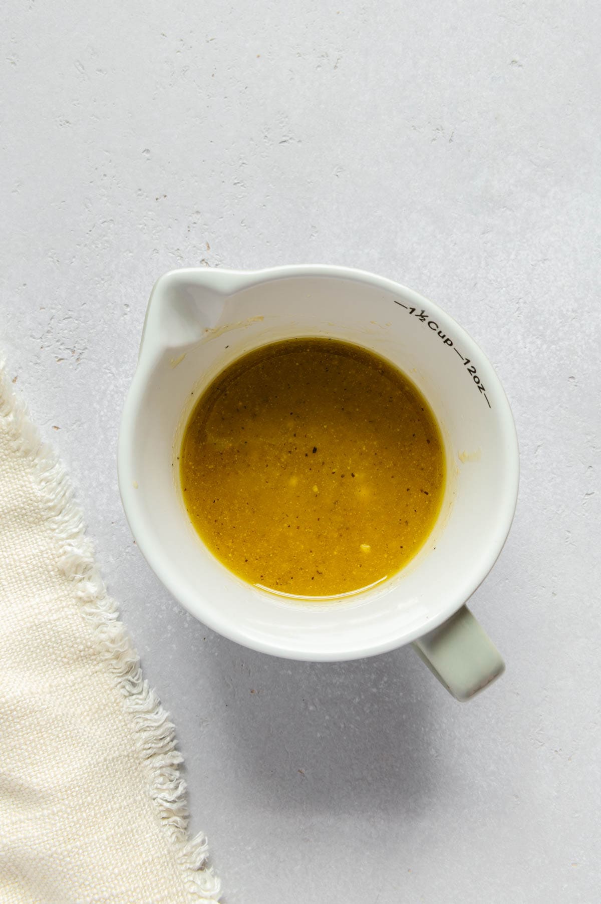 Maple apple cider salad dressing in a bowl.
