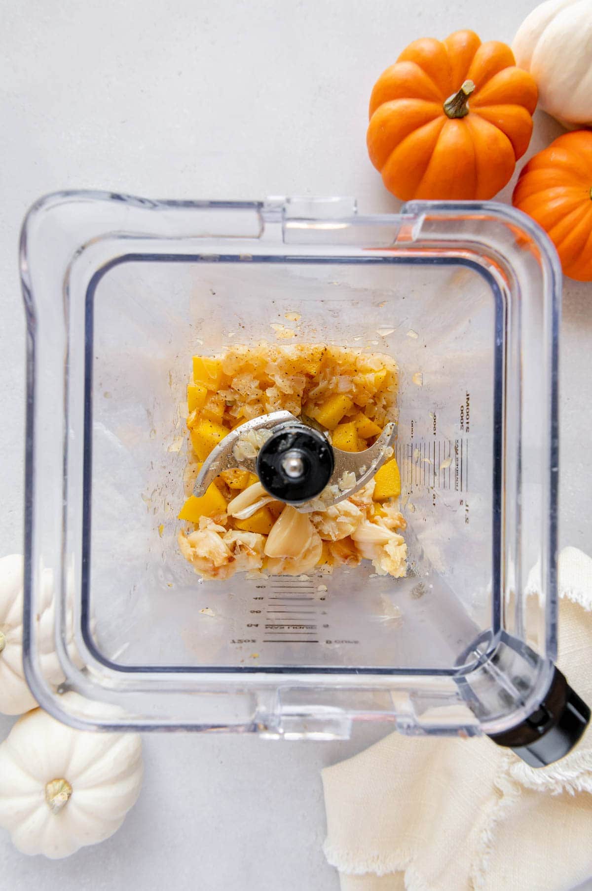 Pumpkin puree ingredients in a blender.