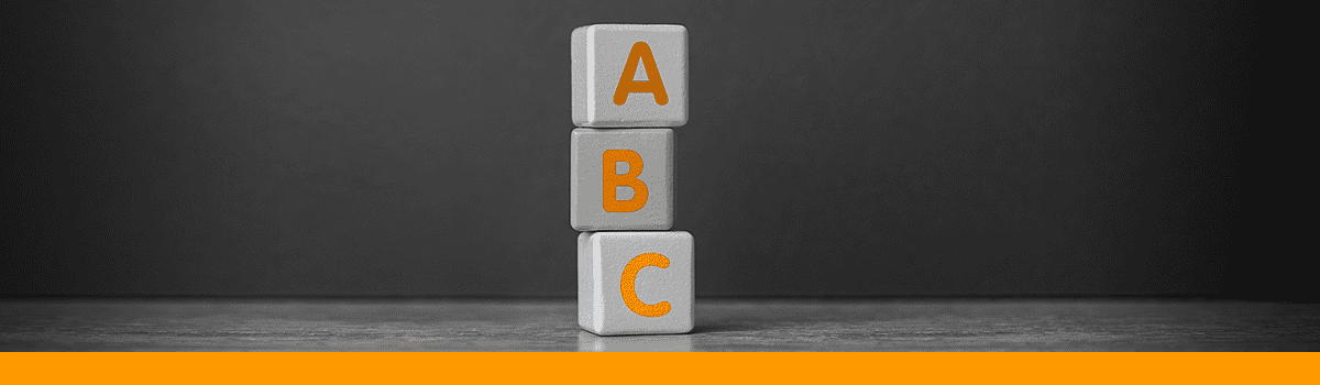 Three building blocks with the letters A, B and C on them stocked on top of each other