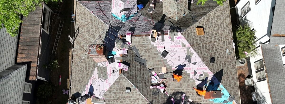 Charlotte Ace Roofing crew installing a new Owens Corning asphalt shingle roof on a home in Charlotte, NC