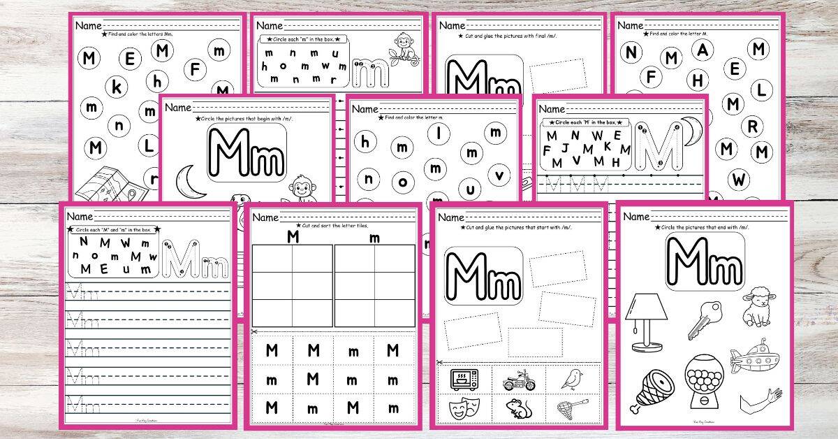 Letter M worksheets with pink backings on a wooden plank background