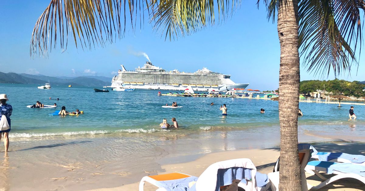 cruise ship docked at beach