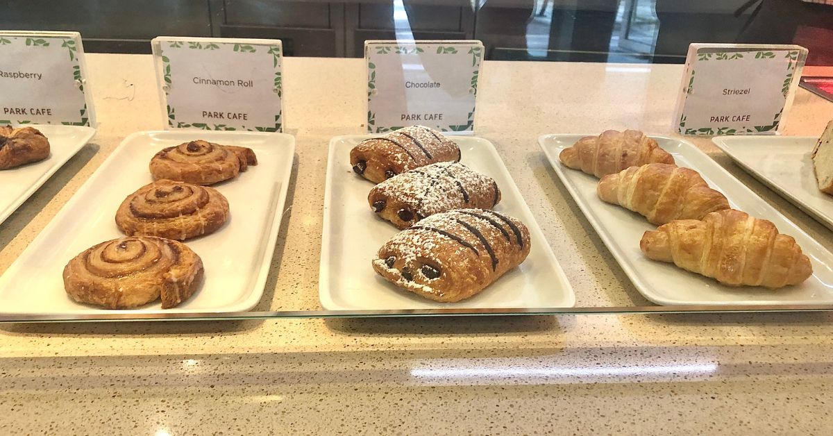 pastries in a case with labels