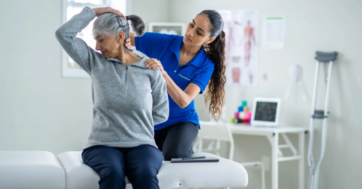 Book Expert Physiotherapist in Lahore | Physio at Home 3 Dr Hina Asif treating neck pain of an elderly patient in Model Town Lahore
