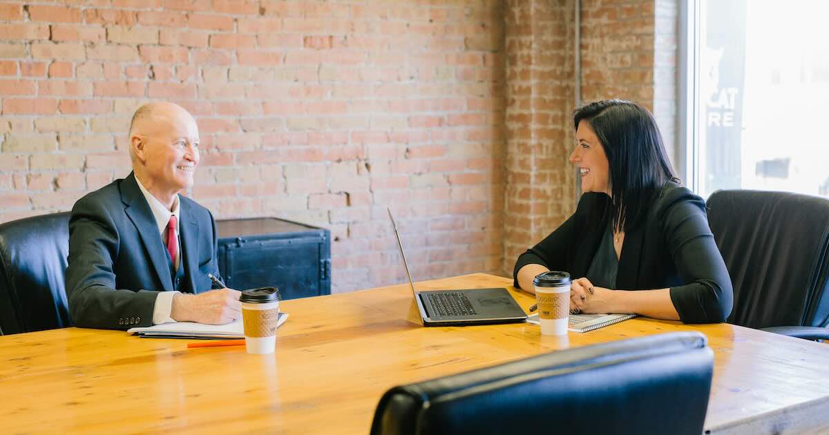 Two people in a meeting