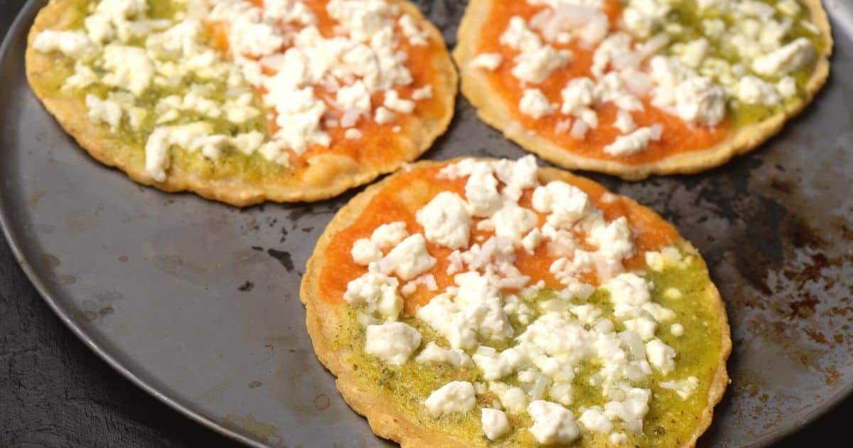 three memelas on a cooking comal