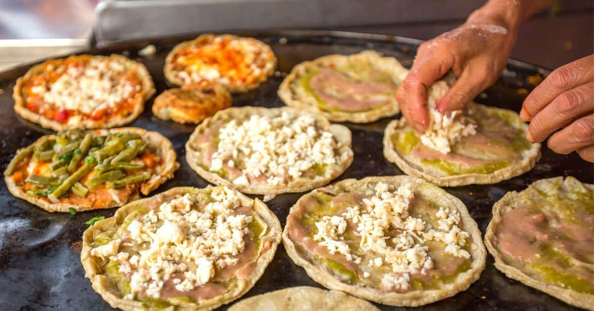 memelas on a comal grill
