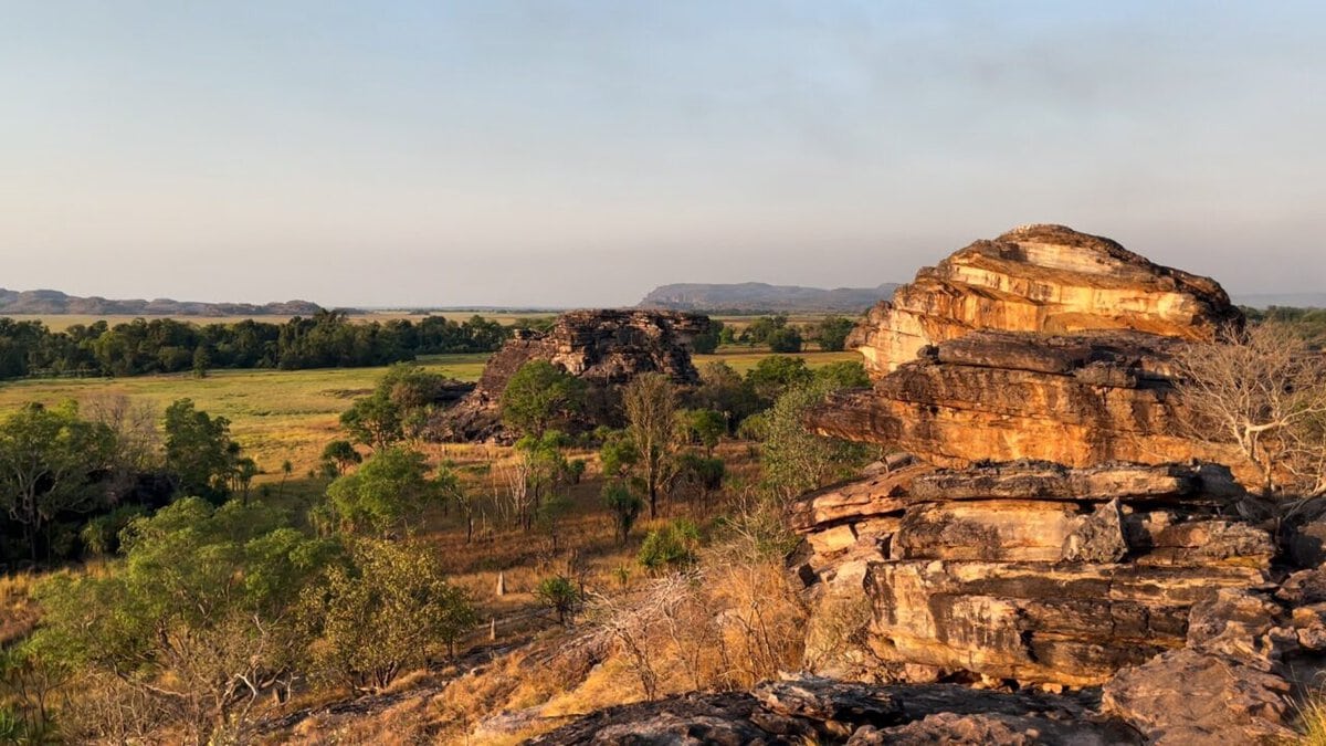 Australian escarpment at sunset with green plains in the background