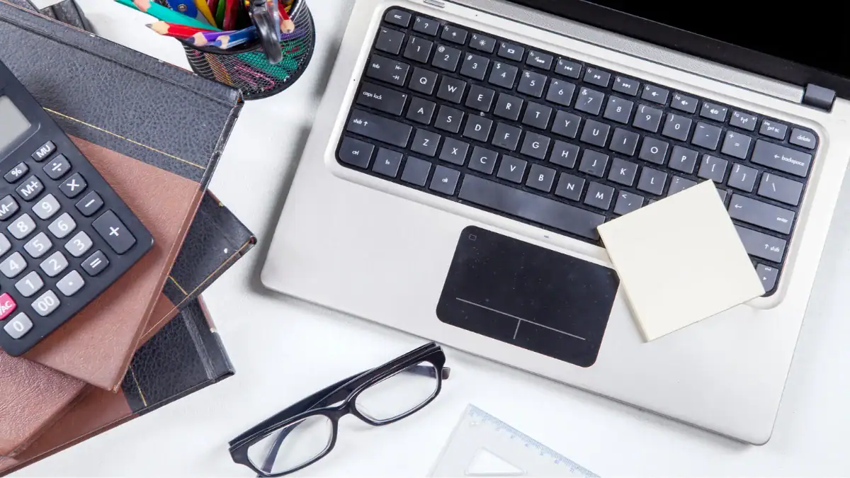 A student’s desk with notes and books