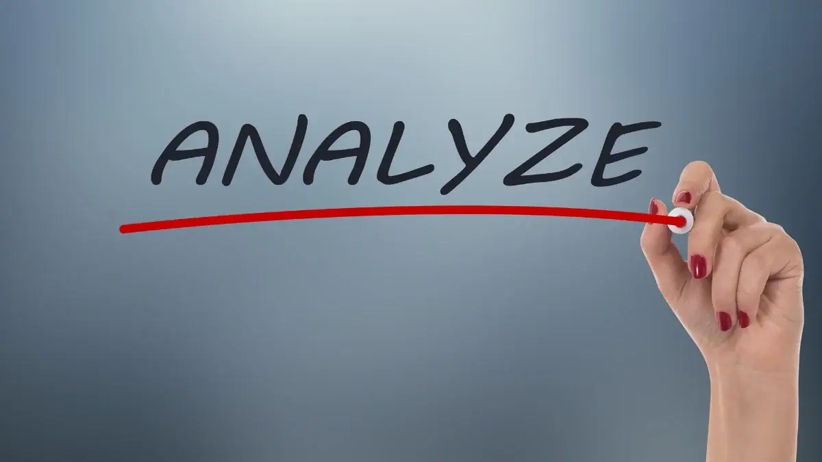 Businessman analyzing data on a computer screen