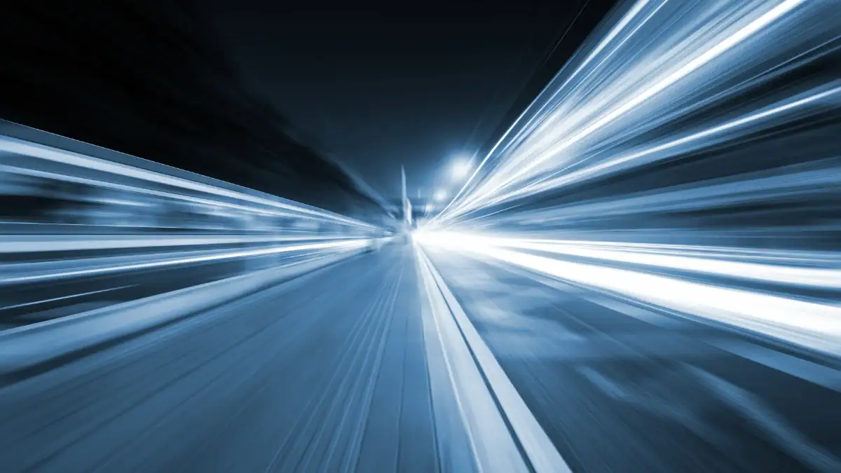 A person typing on his computer and working on his blog, symbolizing improvements to be made after a Google core algorithm update in October 2023