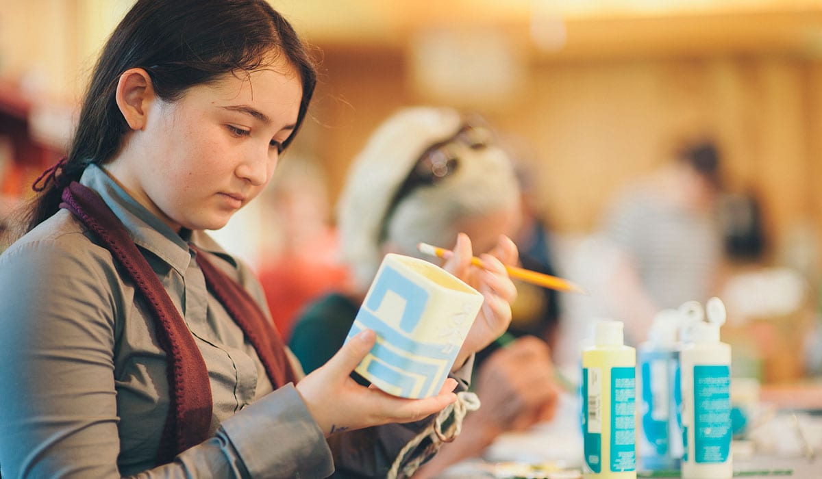 Woman Painting At Camp Michigania