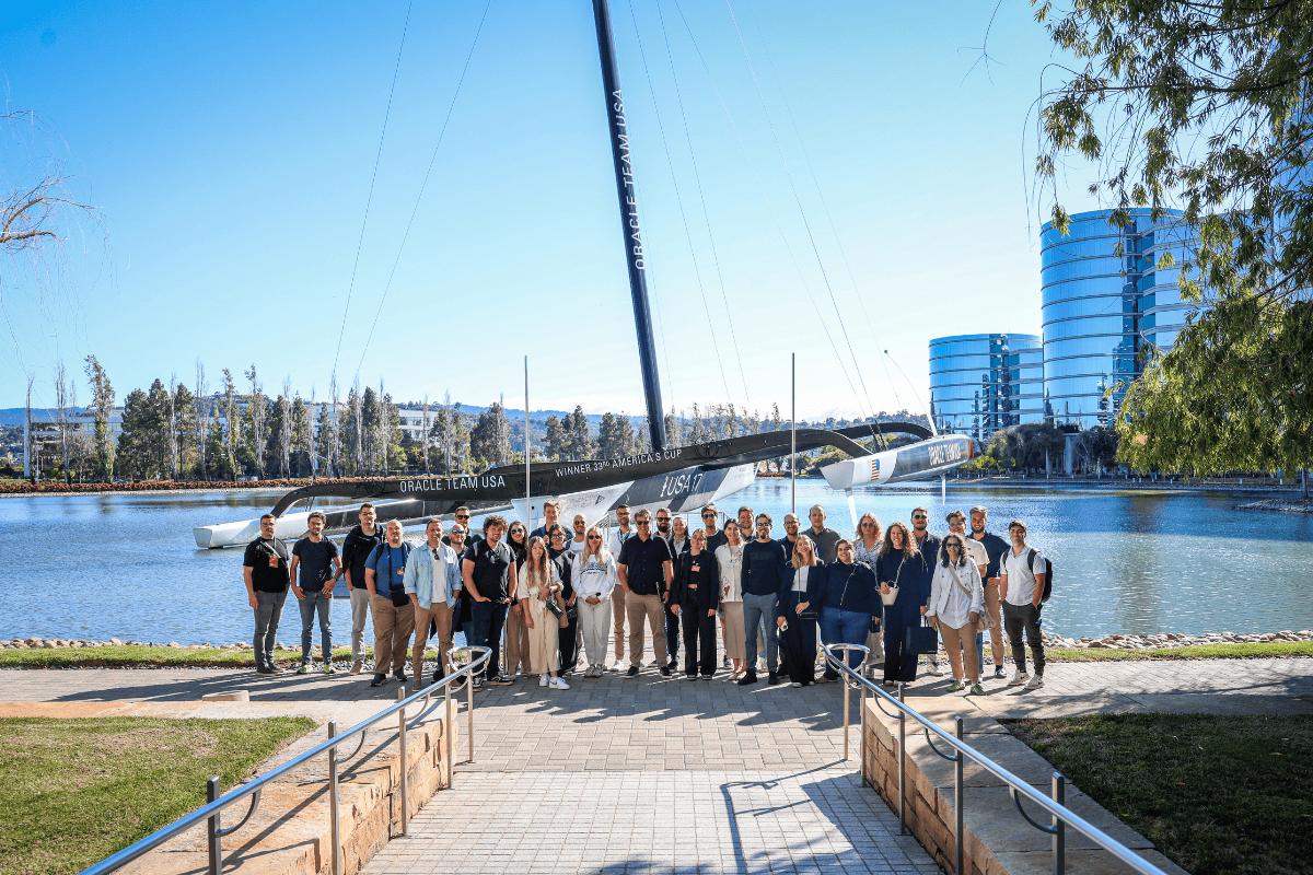 A joint photo of all participants and Ognjen Pavlovic in front of the Oracle headquarters.
