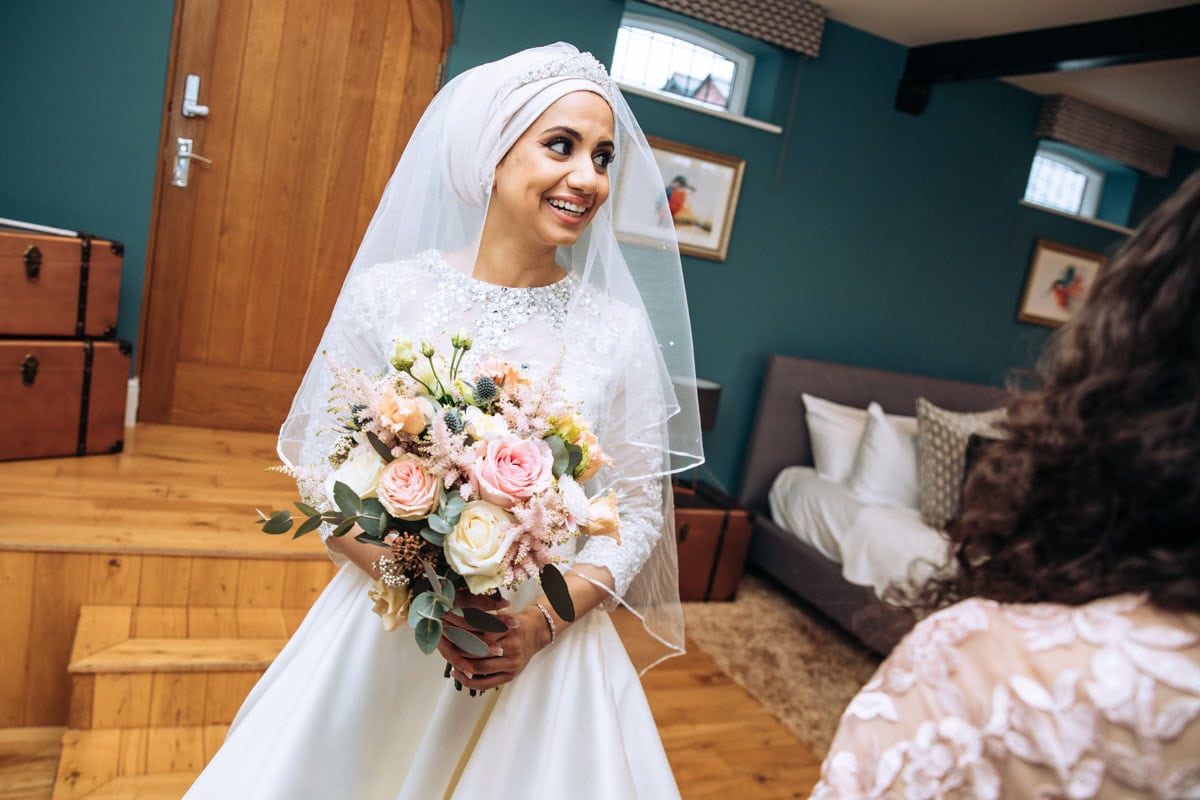 Bride and flowers at Colshaw Hall Wedding