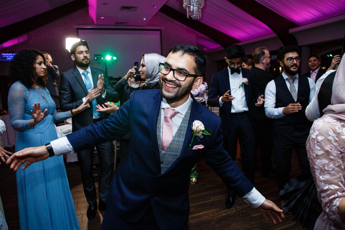 colshaw hall groom enjoying the party