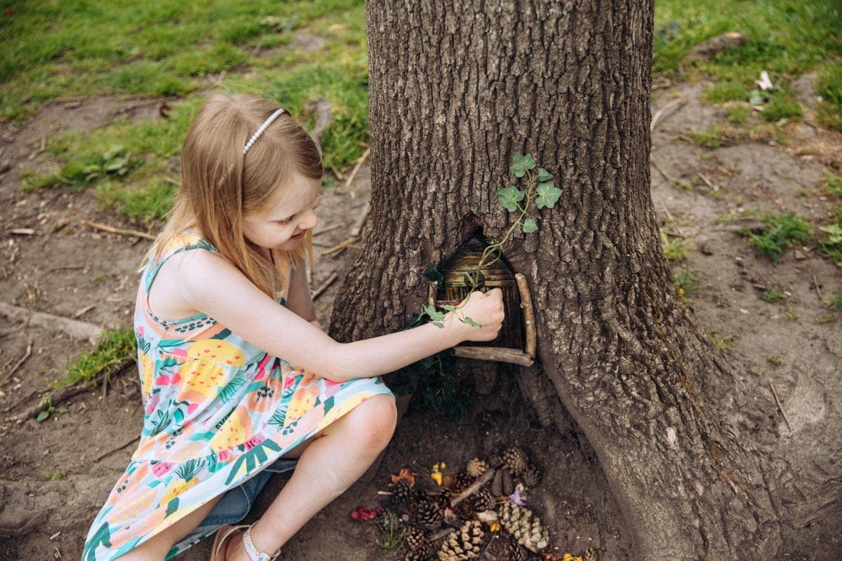 Girl finds magical door in tree