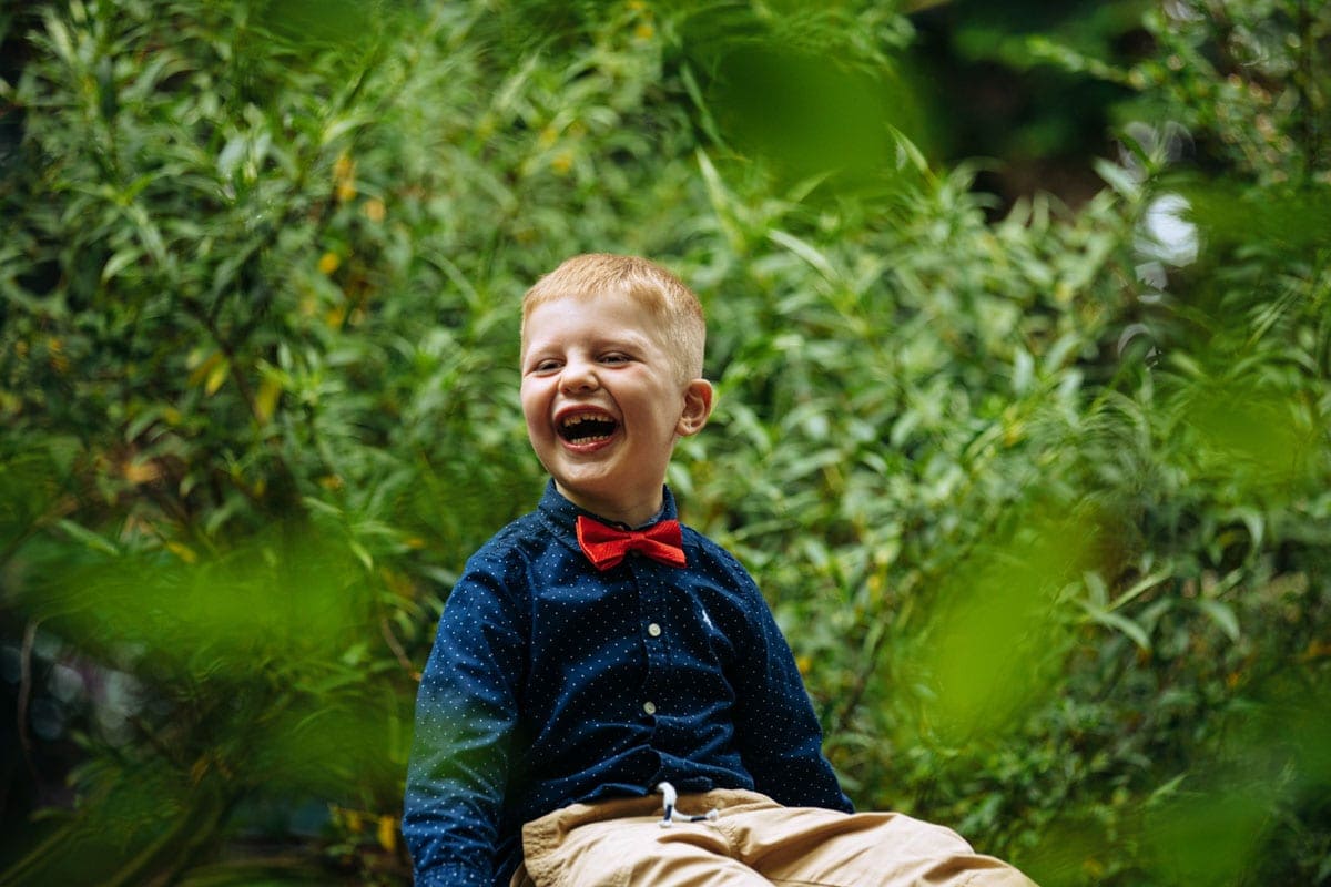 young boy laughing