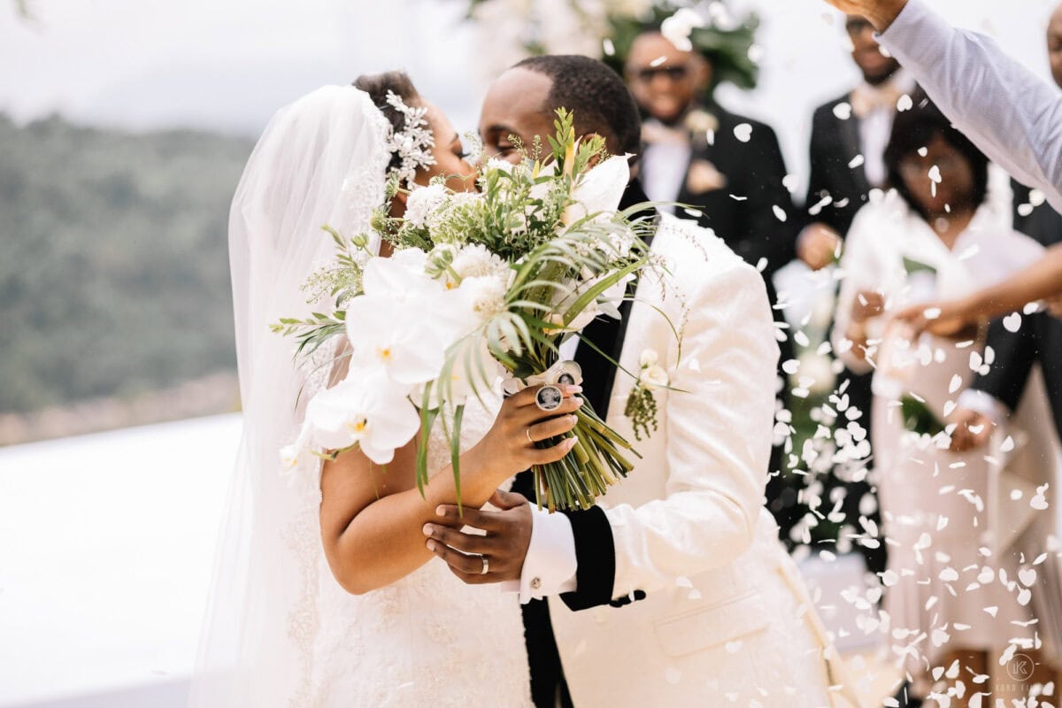 Newlyweds celebrating with confetti, photographed by Koro Films