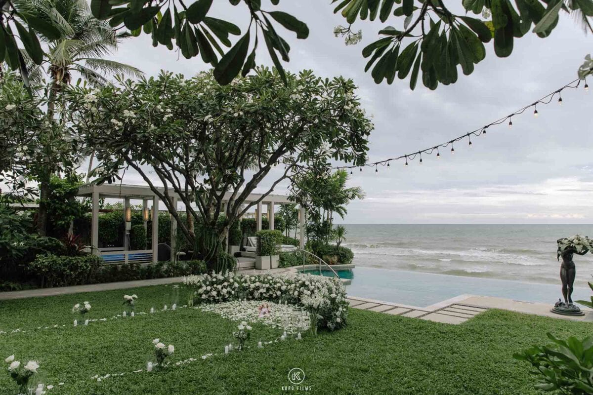 Heart of white flowers and string lights on the seafront lawn of La Residence Villa, InterContinental Hua Hin, before the proposal