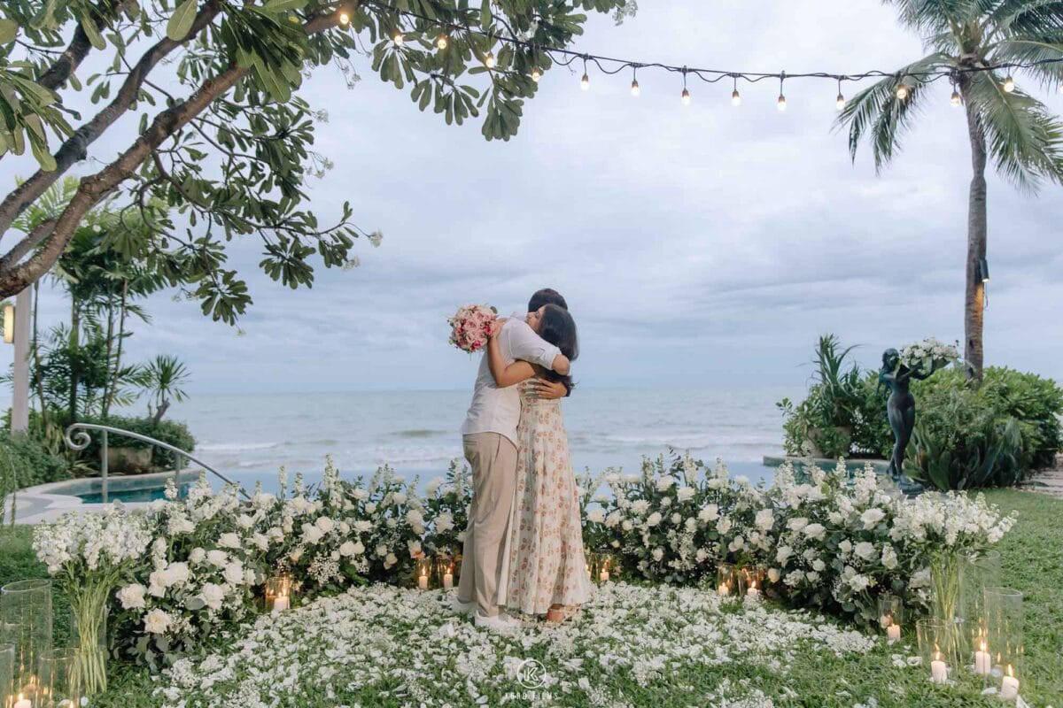 Vatsal and Paridhi embrace in the heart of white flowers by the sea after she says yes, Hua Hin