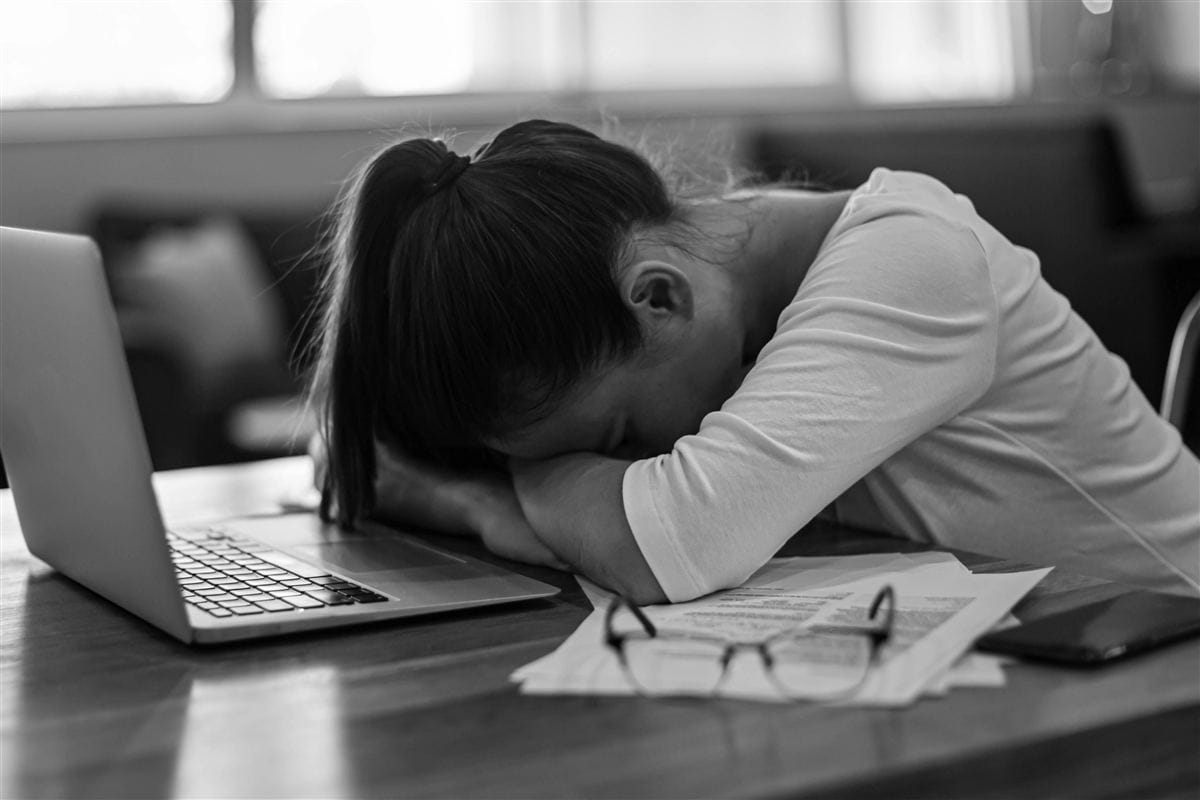 Frustrated personal injury client feeling ignored by an unresponsive lawyer