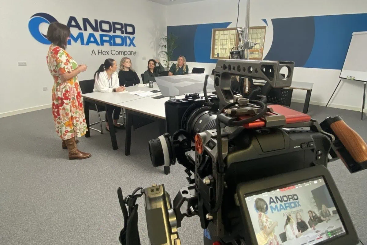 Cinema camera rig filming a boardroom interview at Anord Mardix