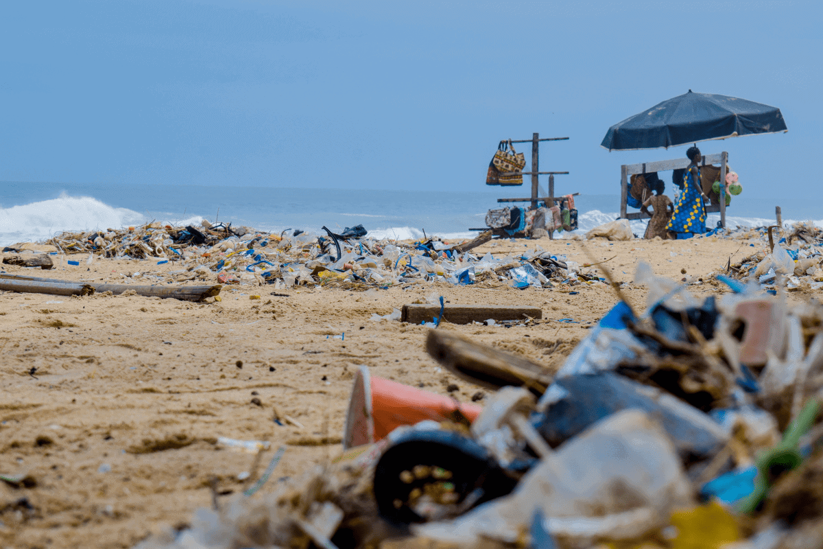 Beach with plastic rubbish piled up