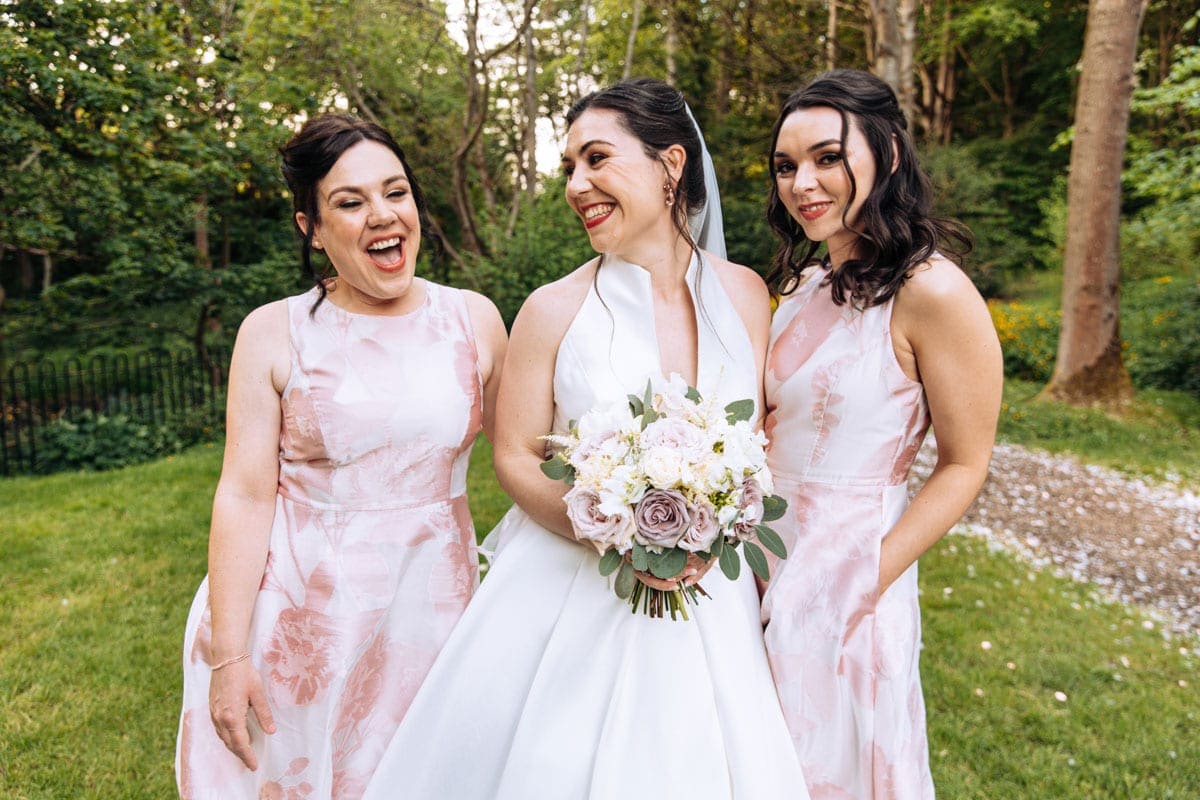 bride and bridesmaid at the woodman inn