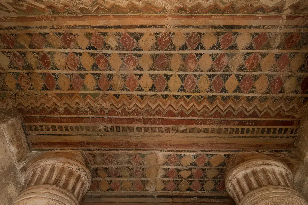 Geometric ceiling patterns in a rock-cut chapel
