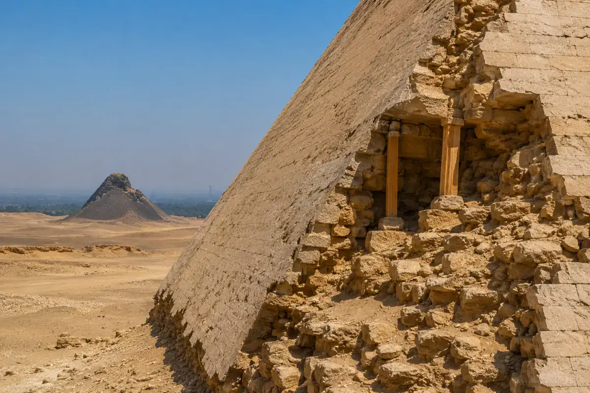 Surviving limestone casing with the Black Pyramid in the distance