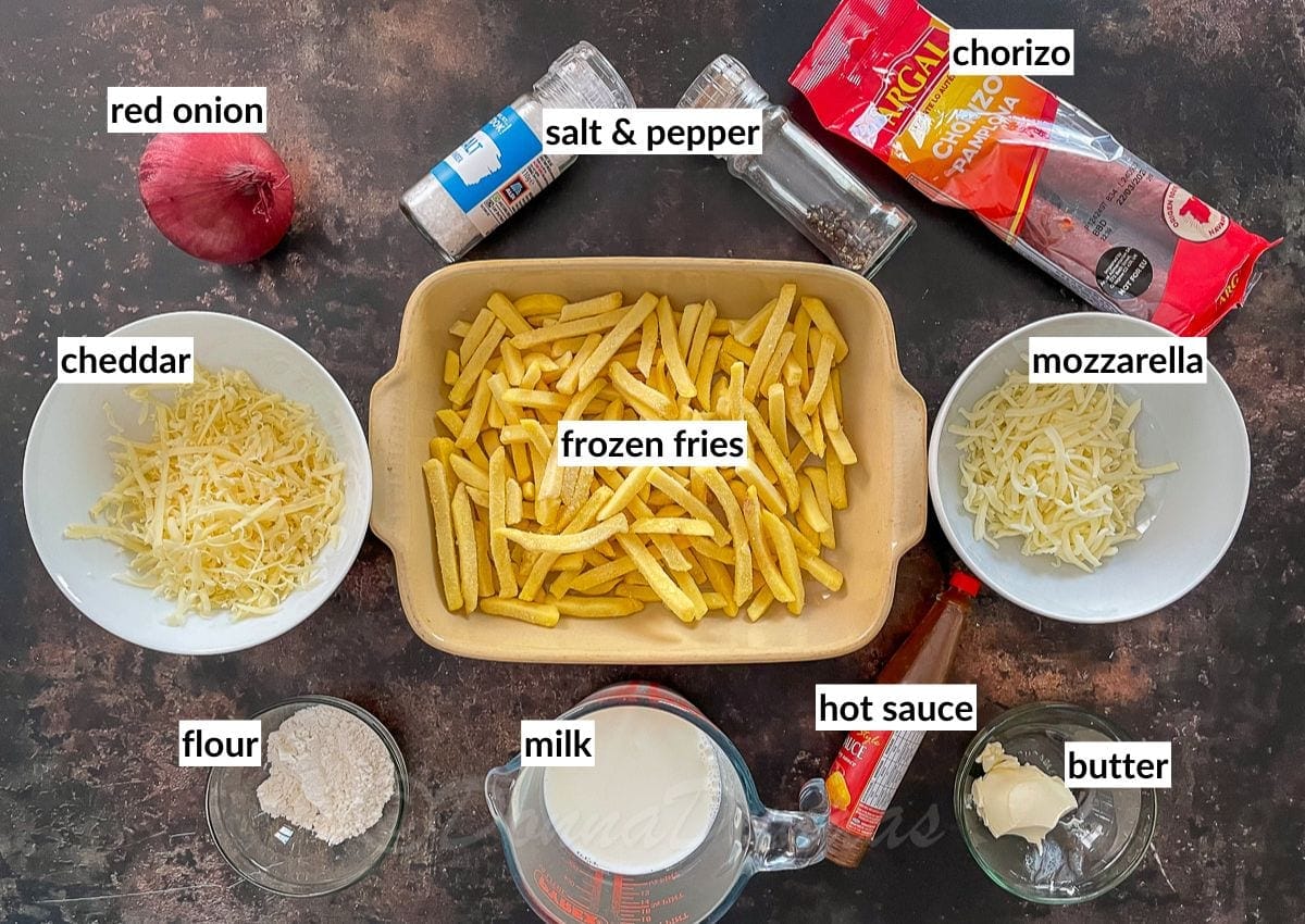 dirty fry ingredients - fries, milk, hot sauce, butter, mozzarella, chorizo, salt and pepper, red onion, cheddar and flour.