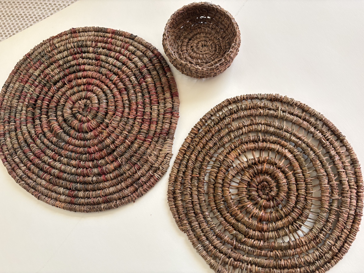 three pine needle hangings