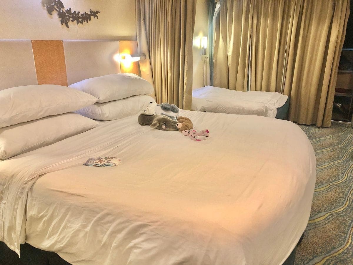 king bed and pullout in junior suite on Royal Caribbean Oasis of the Seas