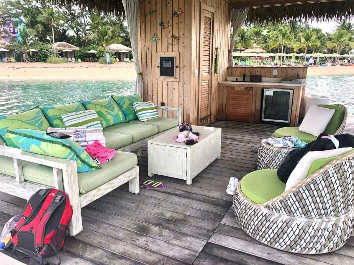 cabana seating, tables, mini fridge